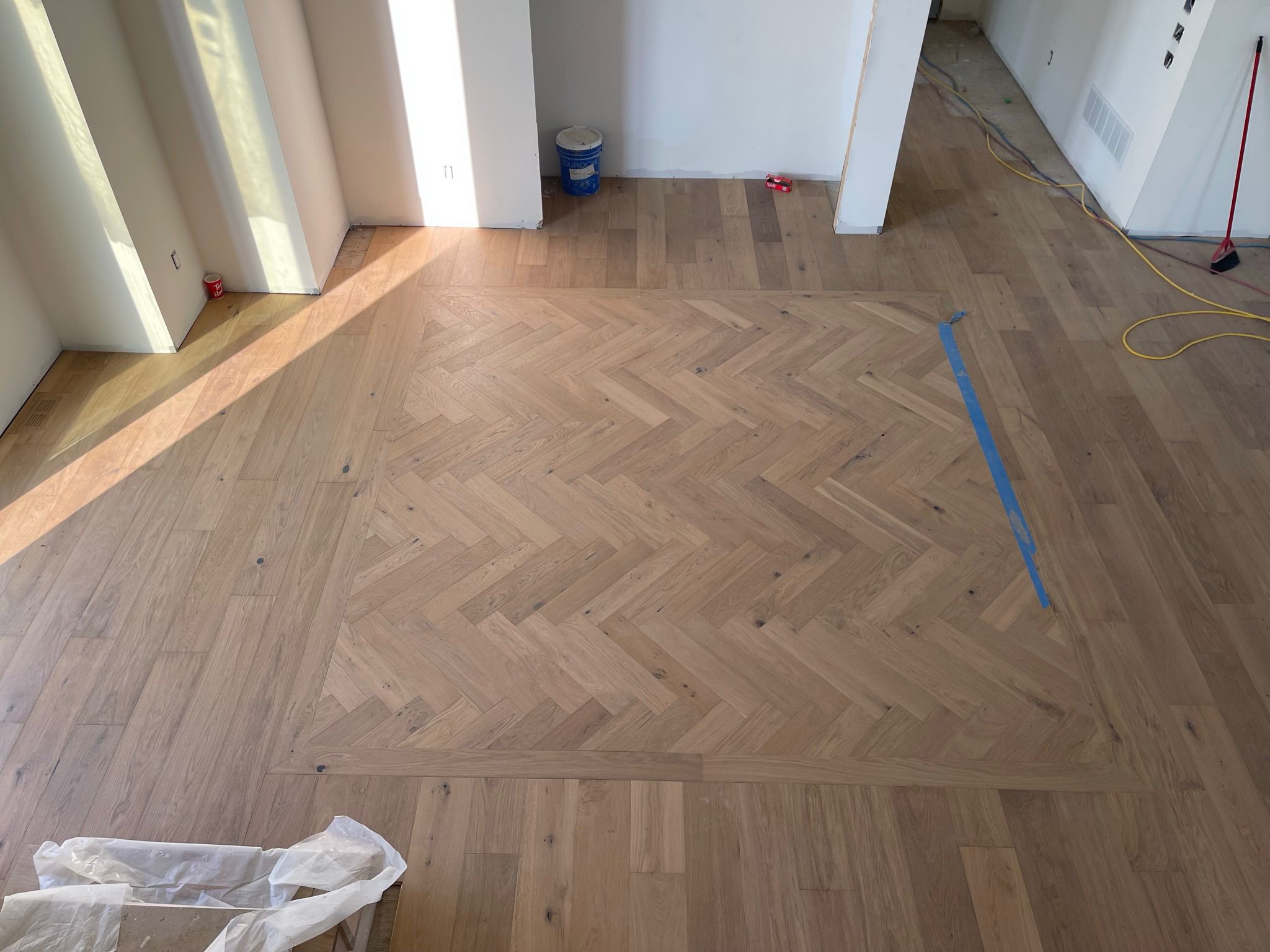 Oak herringbone hardwood flooring installation